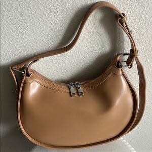 BRAND NEW: Madison West Tan Crescent Shoulder Bag with Metallic Accents